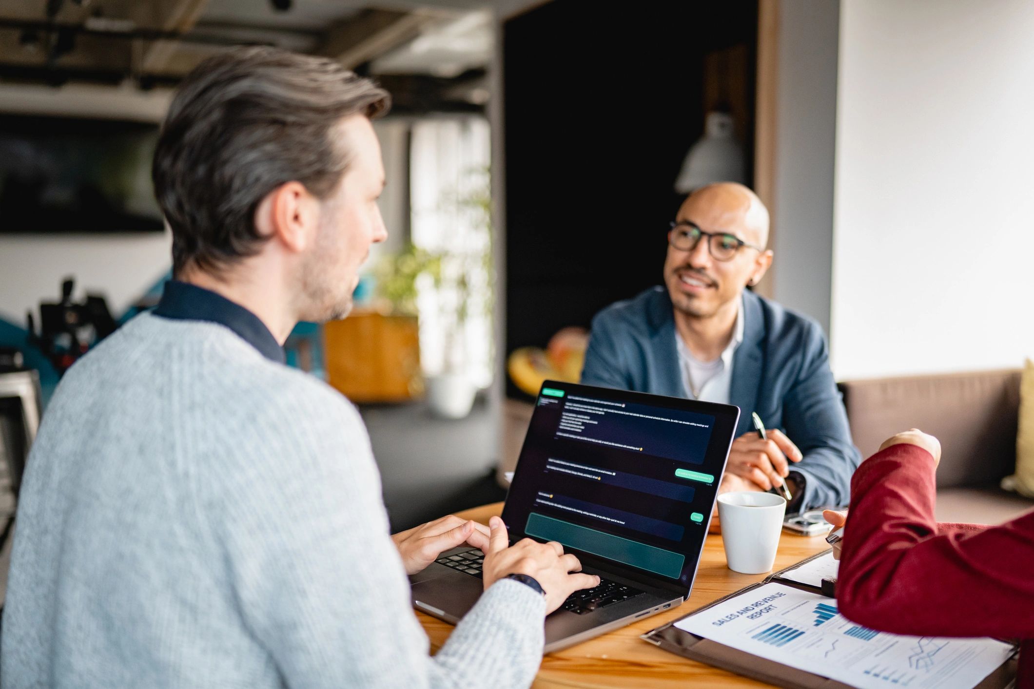 Team discussing digital strategy in a modern office