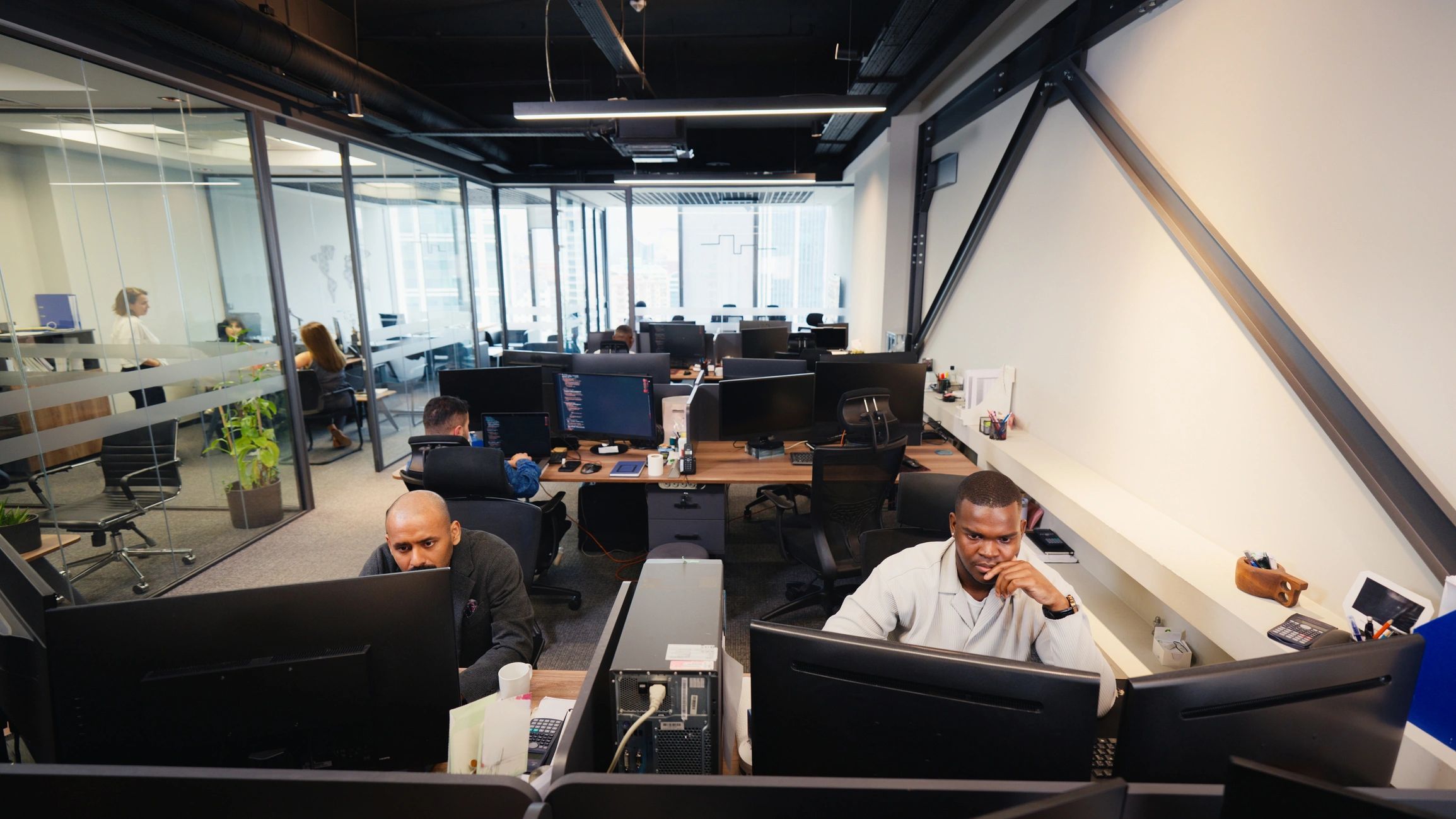 People working in a modern corporate office